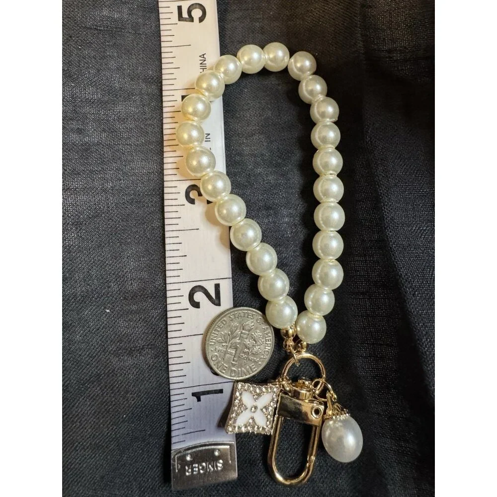 Phone Case Wristlet Bag Universal Charm Strap Faux Pearl Gold Clover NEW